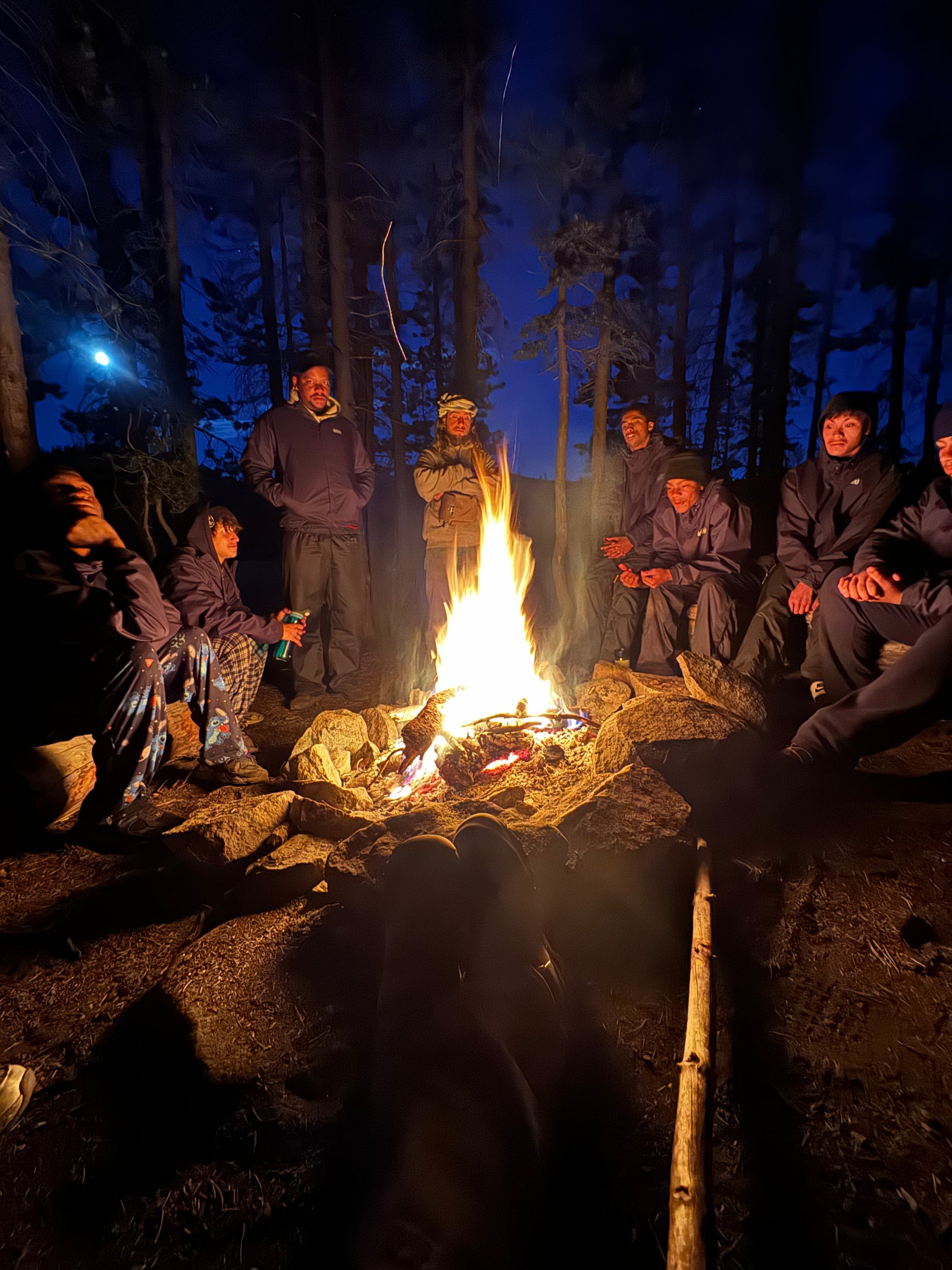 Small campfire surrounded by rocks