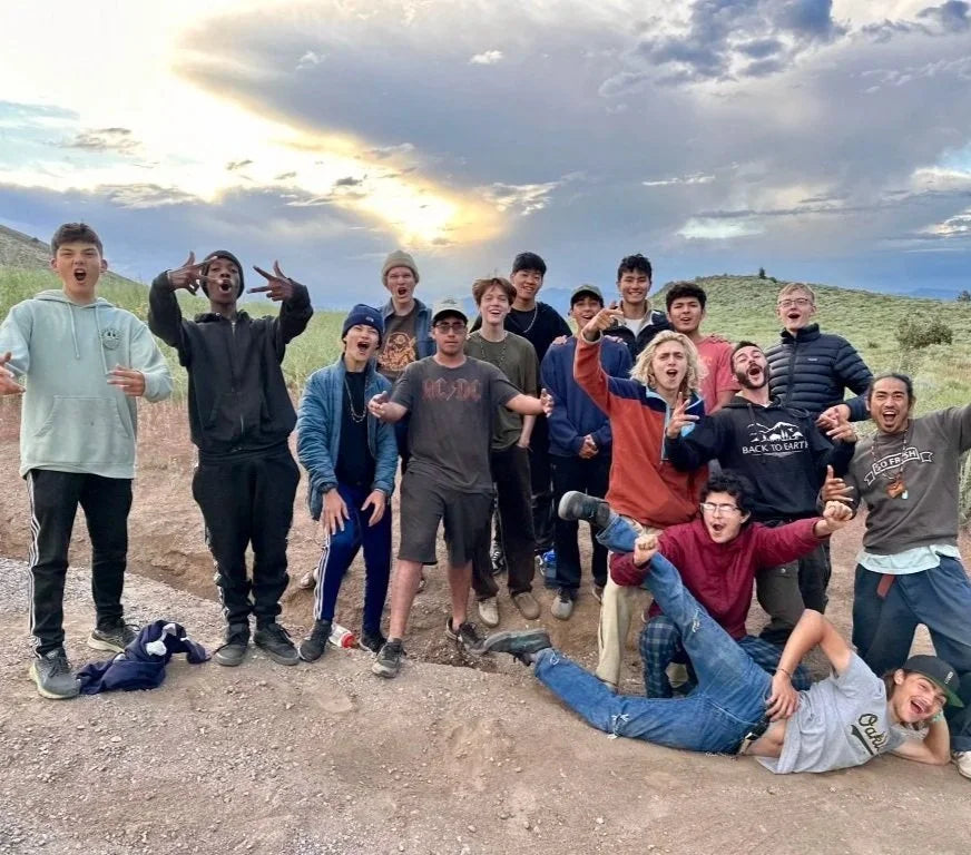 Group of teenagers on a dirt trail